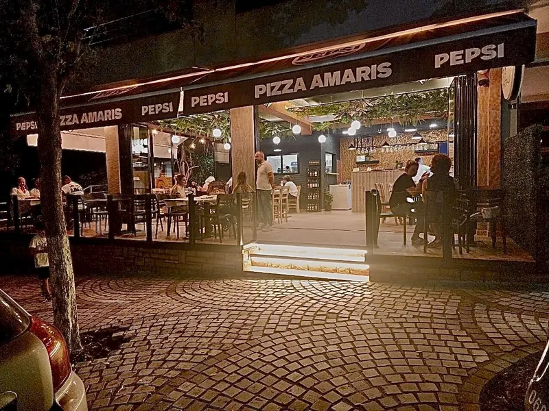 The corner terrace and cobbled street at night